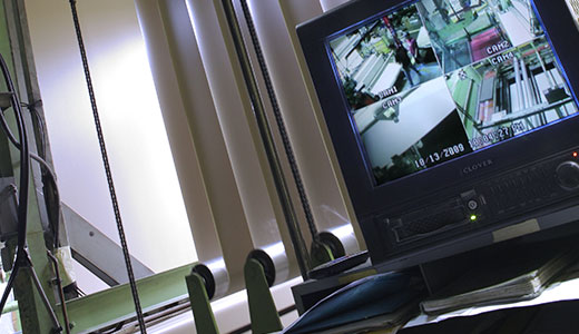 Security TV showing the factory floor that is preparing the coating materials